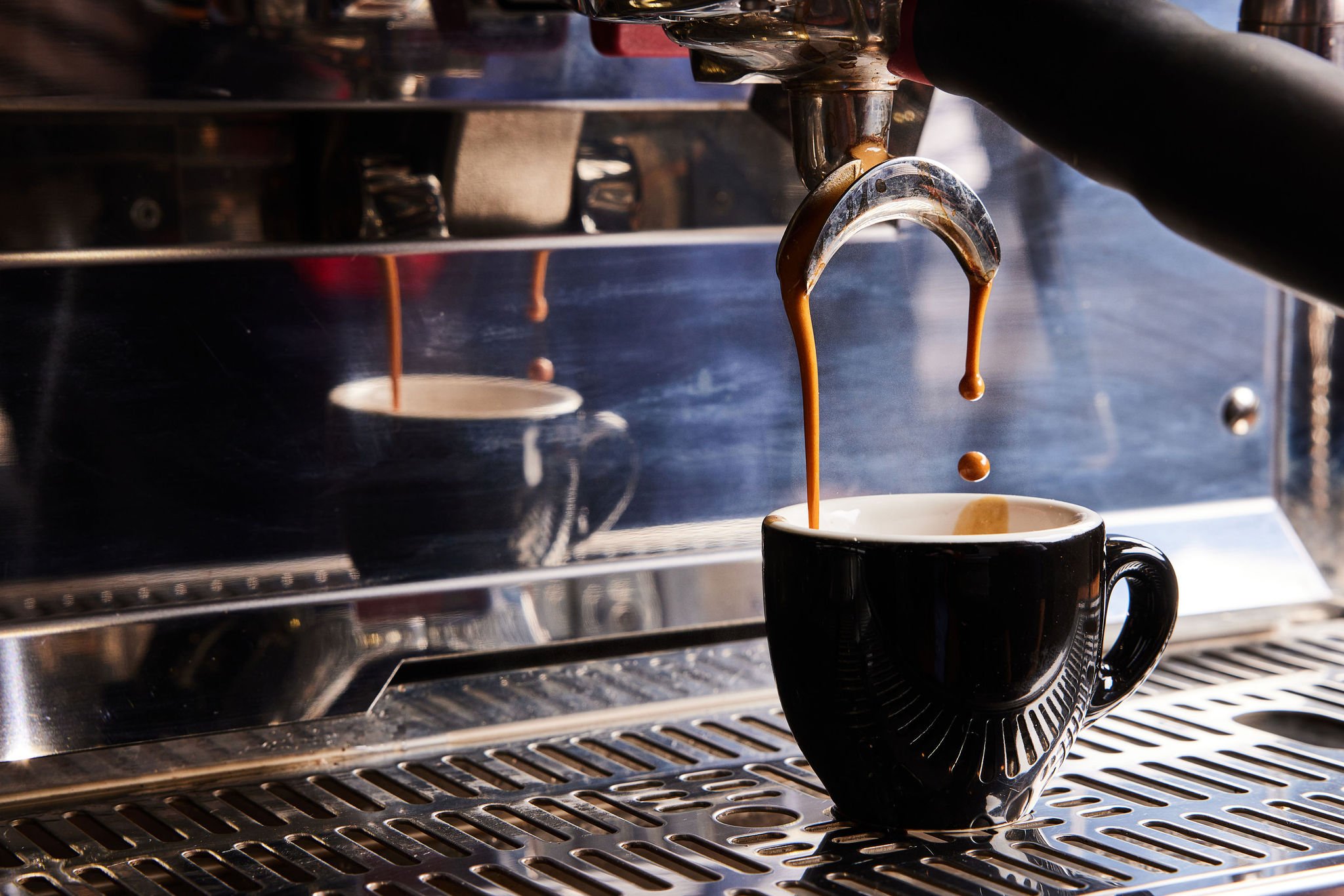 Espresso drips into a cup on an espresso machine at Counterpart at Asher Adams Hotel, Salt Lake City