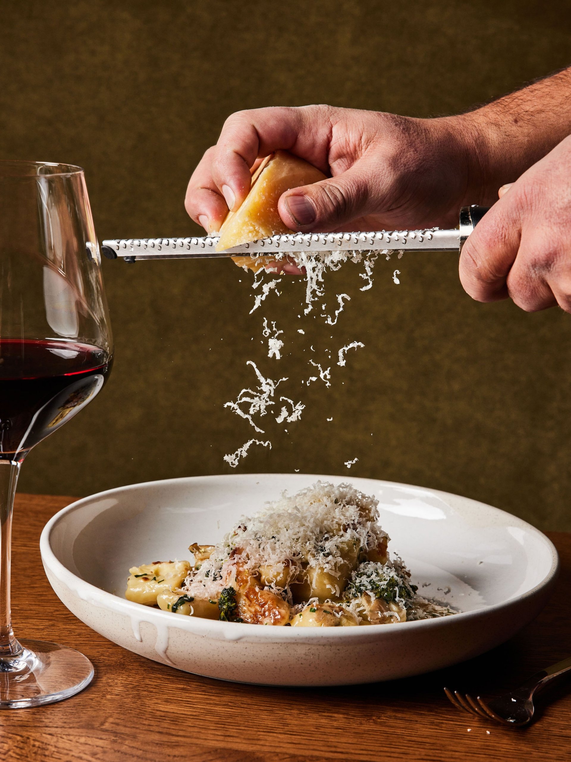 A pasta dish smothered in grated parmesan cheese served at Rouser, restaurant at Asher Adams Hotel, Salt Lake City