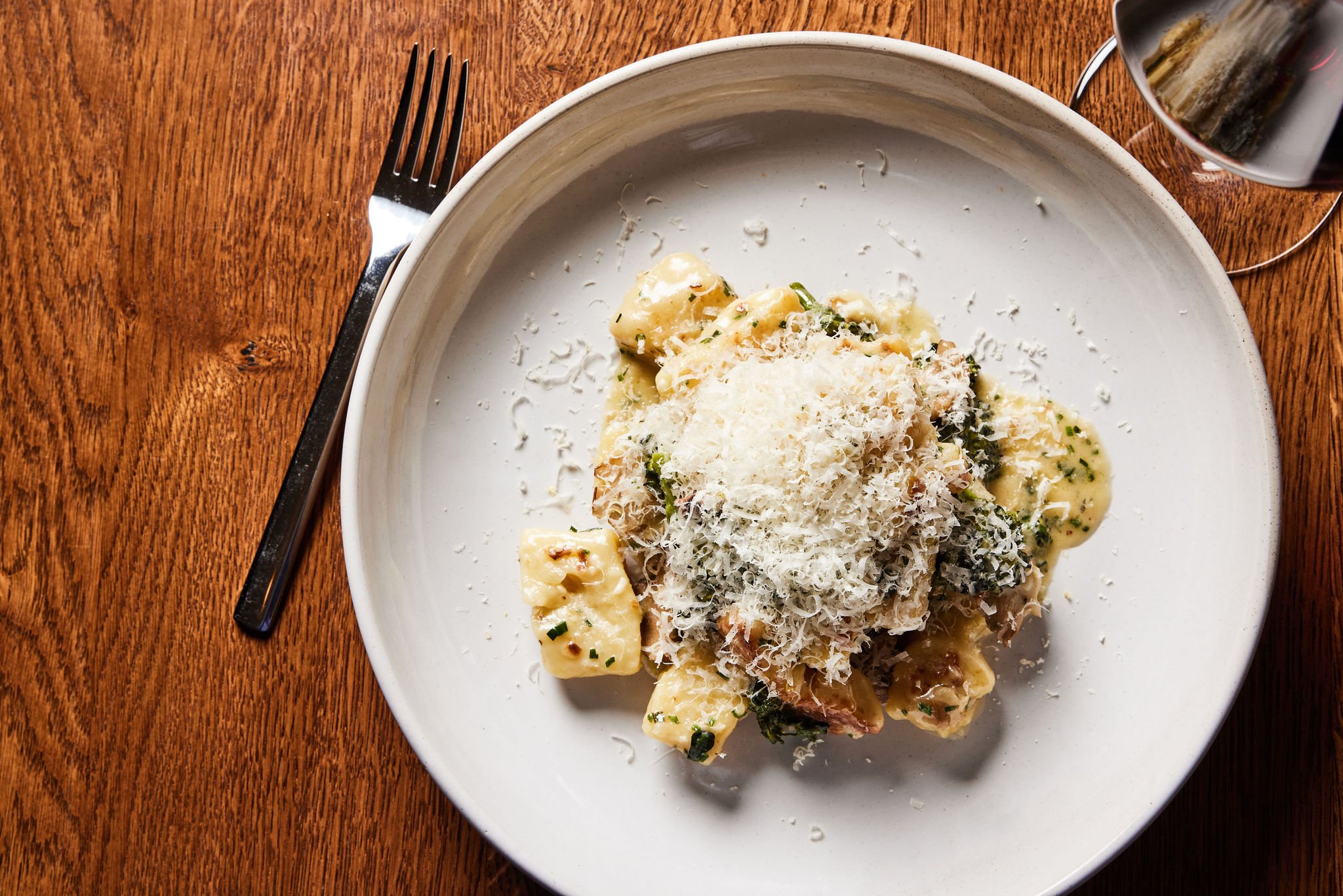 A pasta dish smothered in grated parmesan cheese served at Rouser, restaurant at Asher Adams Hotel, Salt Lake City