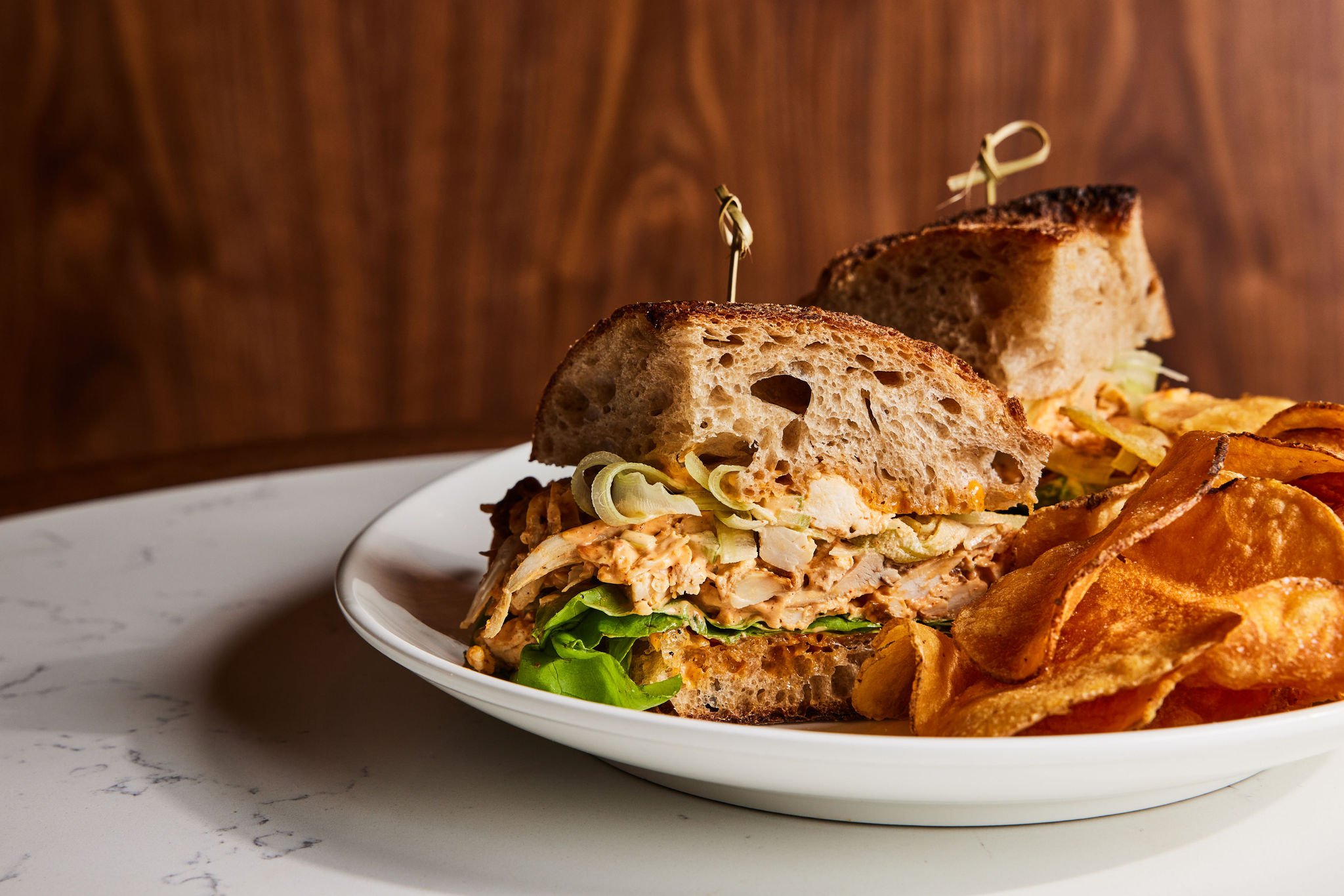 A sandwich and chips at The Bar at Asher Adams, Salt Lake City