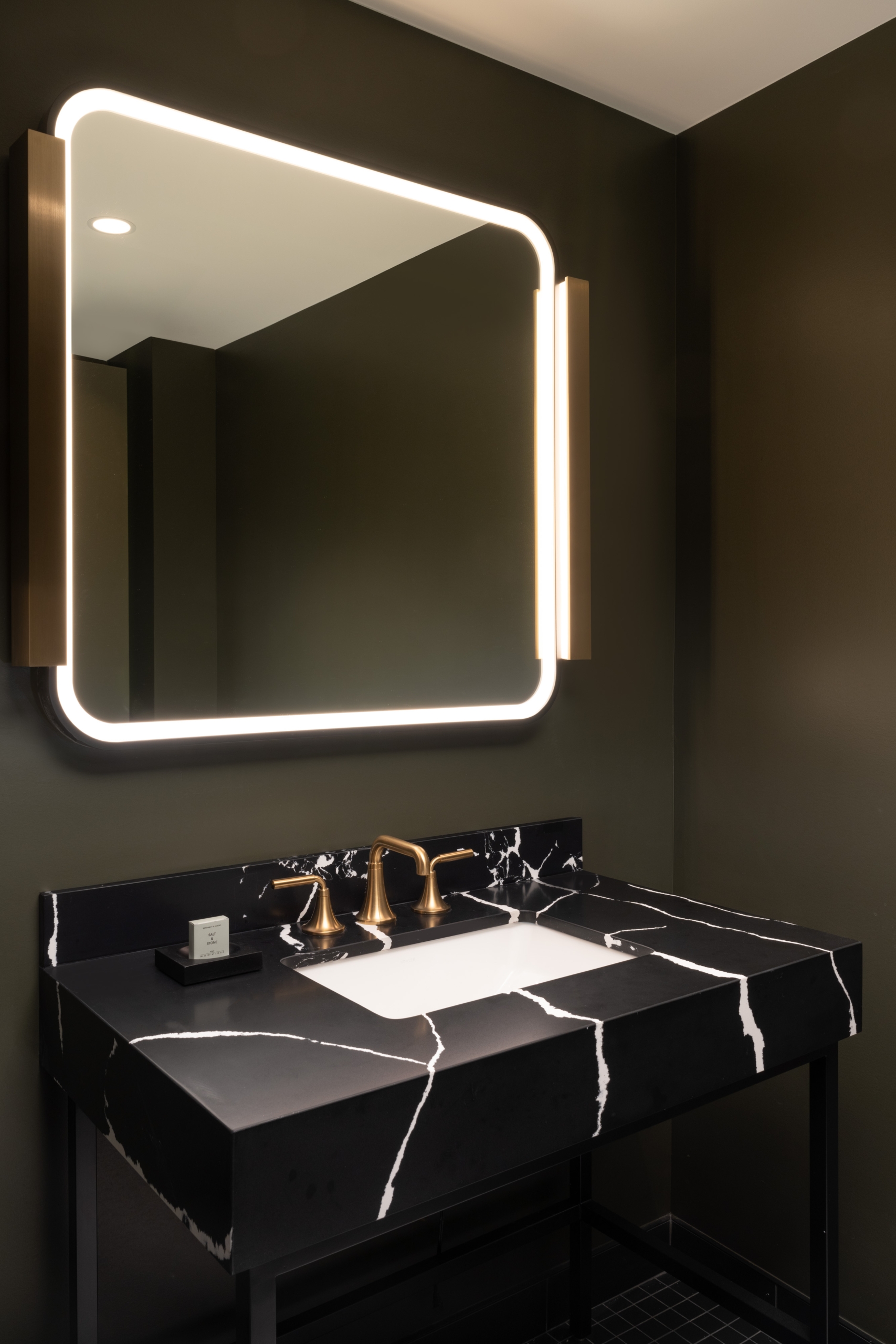 The bathroom vanity in a suite at Asher Adams Hotel in Salt Lake City