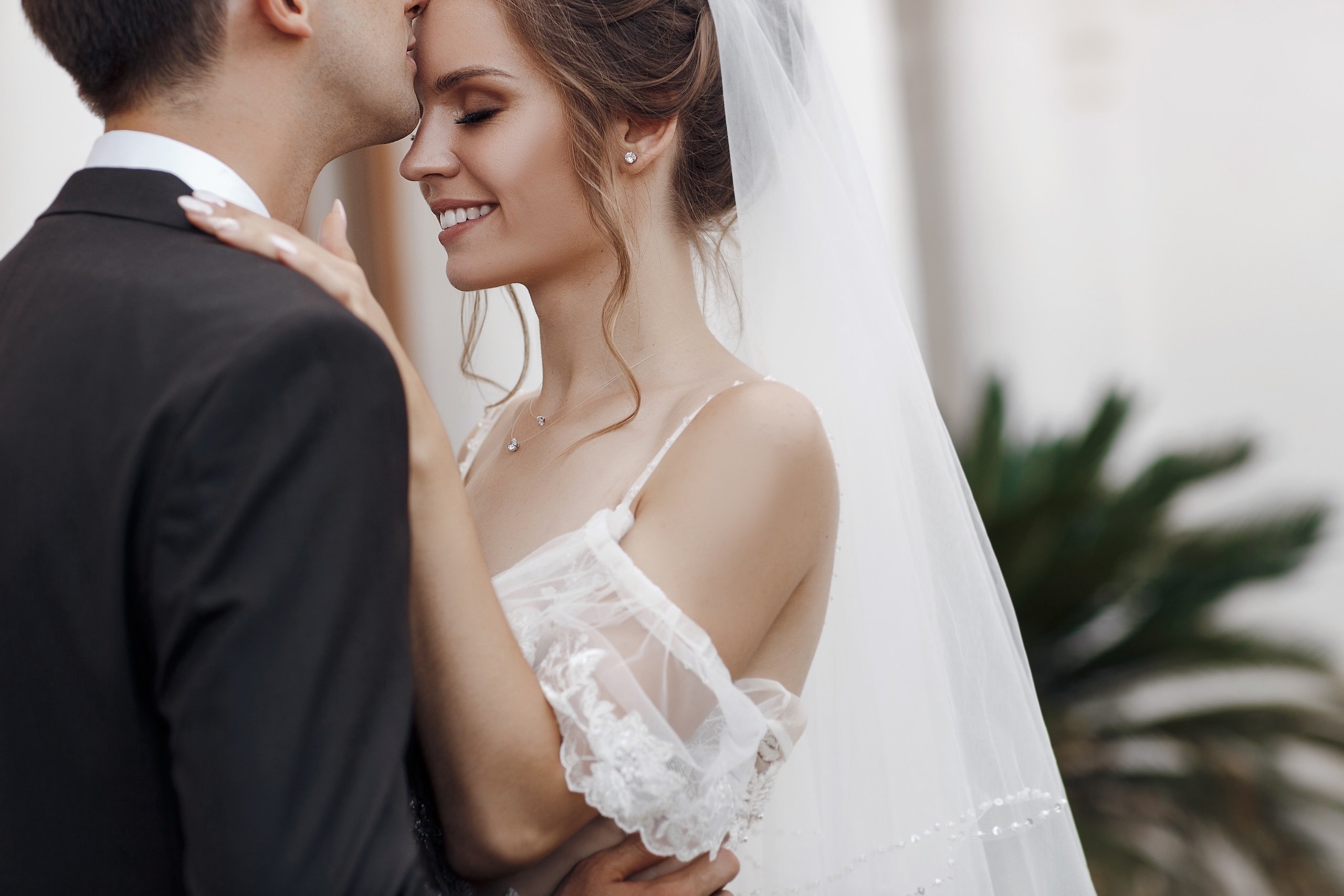 Bridal couple, Newlywed woman and man embracing with love.