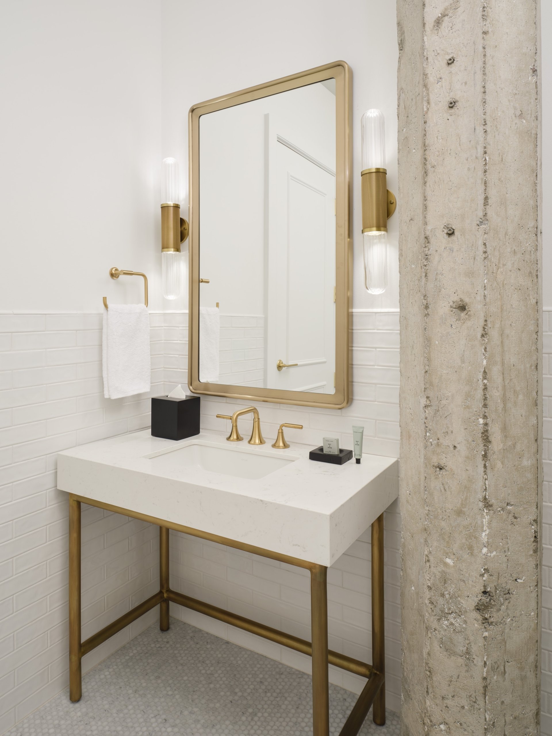 A half bath vanity in a suite at Asher Adams Hotel, Salt Lake City