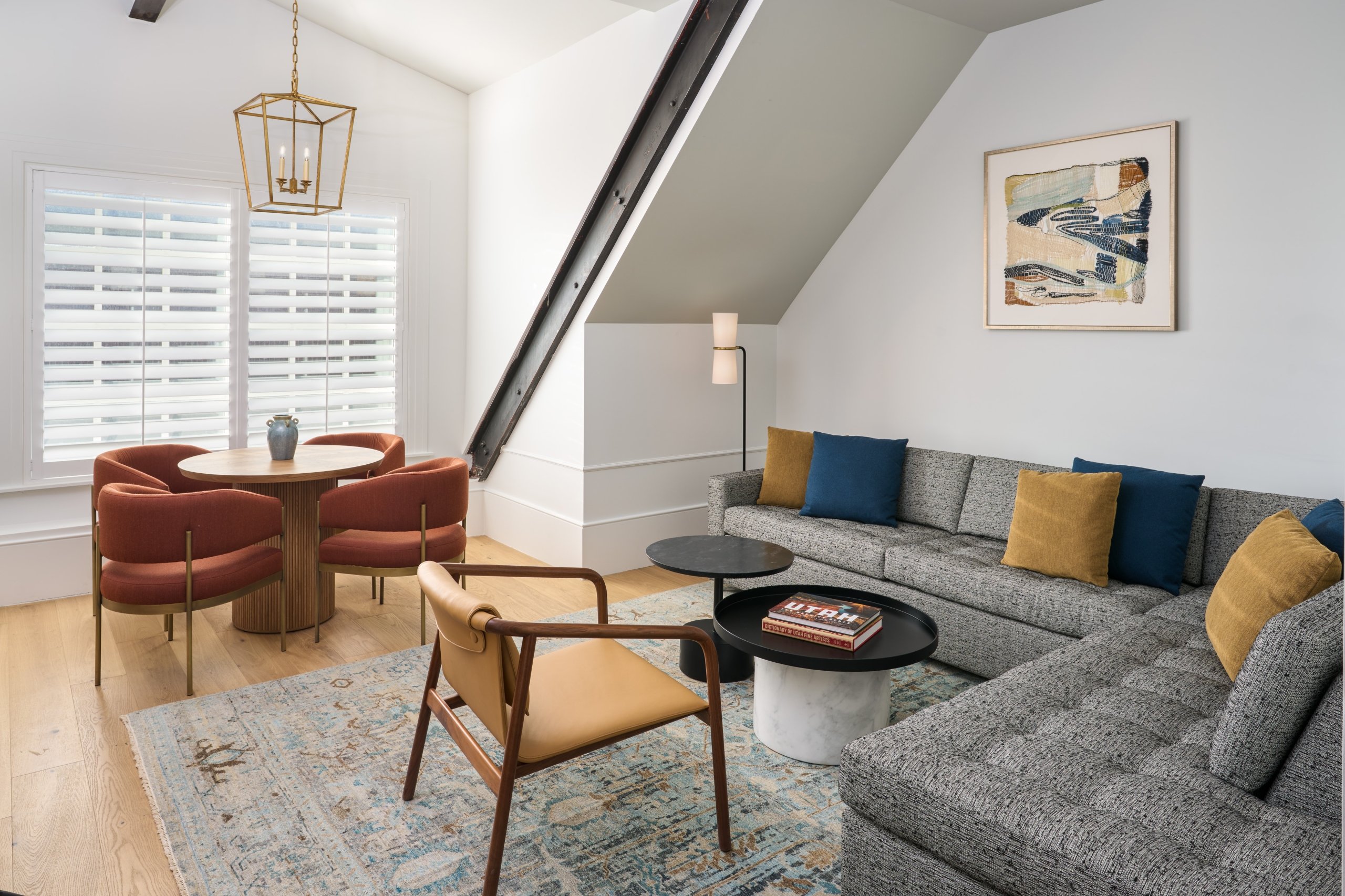 The living room in the Historic Patterson Suite at Asher Adams Hotel