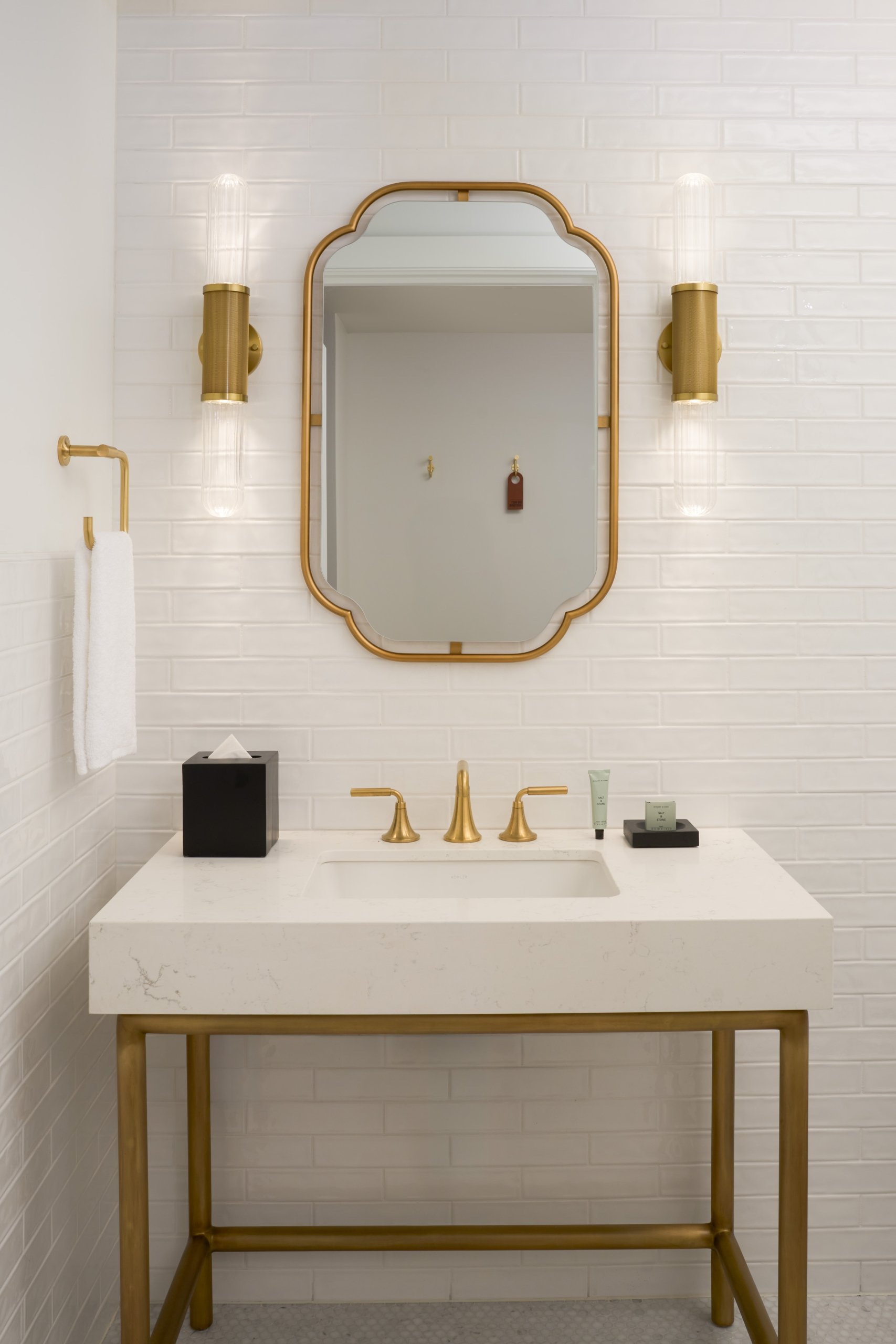 The half bath vanity in the Historic Patterson Suite at Asher Adams Hotel