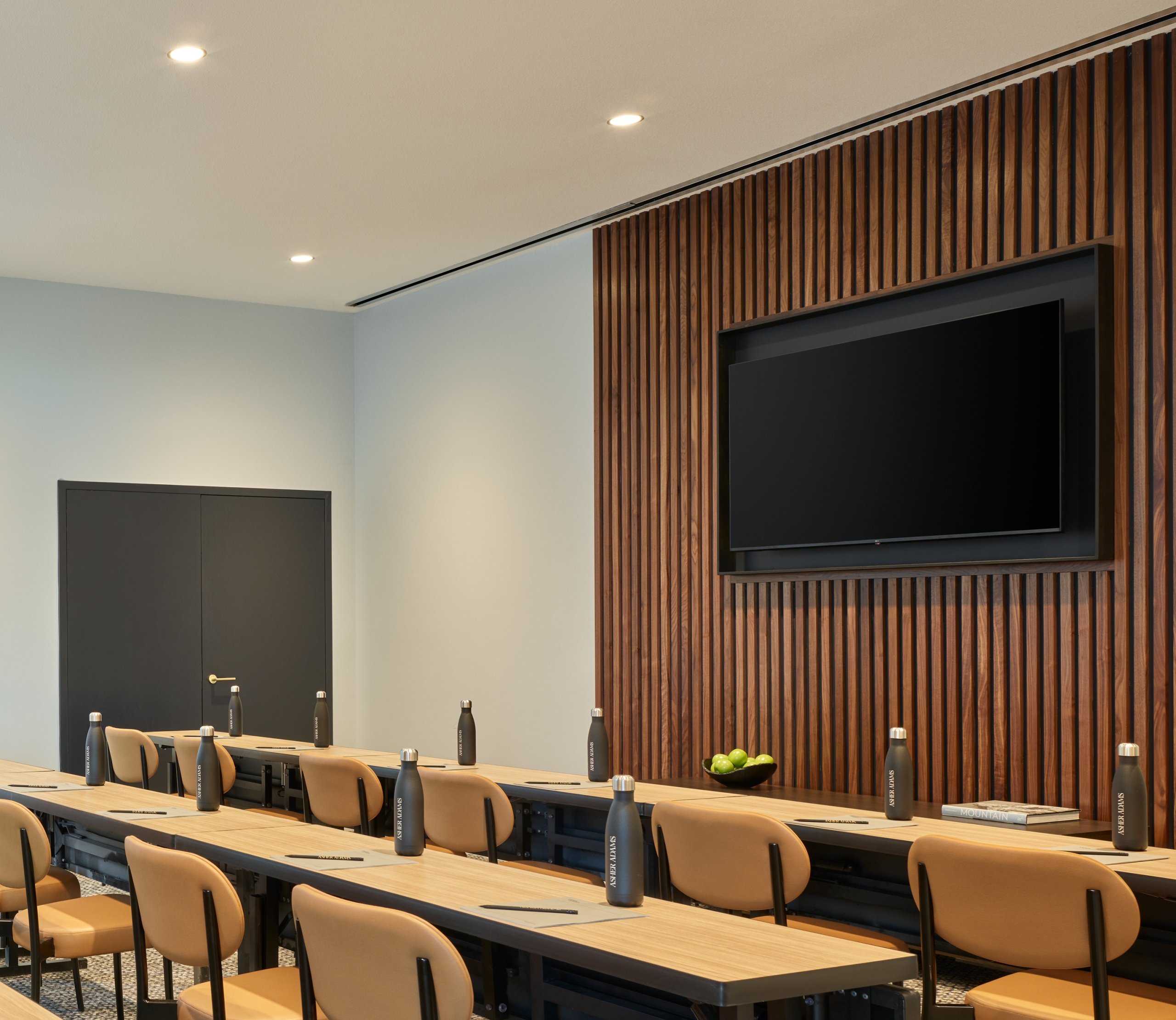 A conference room with places set for a business meeting at Asher Adams Hotel, Salt Lake City