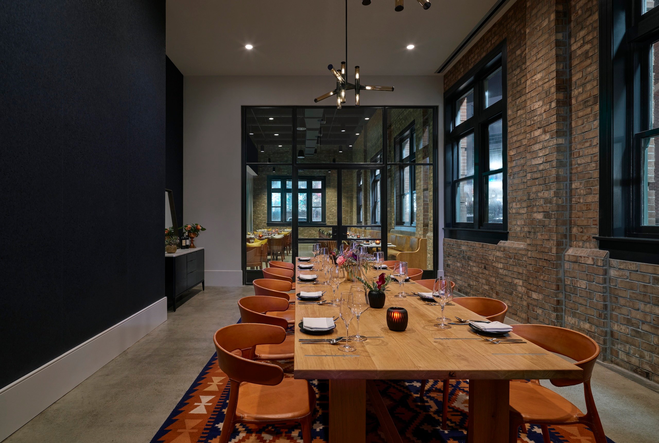 A longer private dining table at a room at Rouser restaurant at Asher Adams Hotel, Salt Lake City