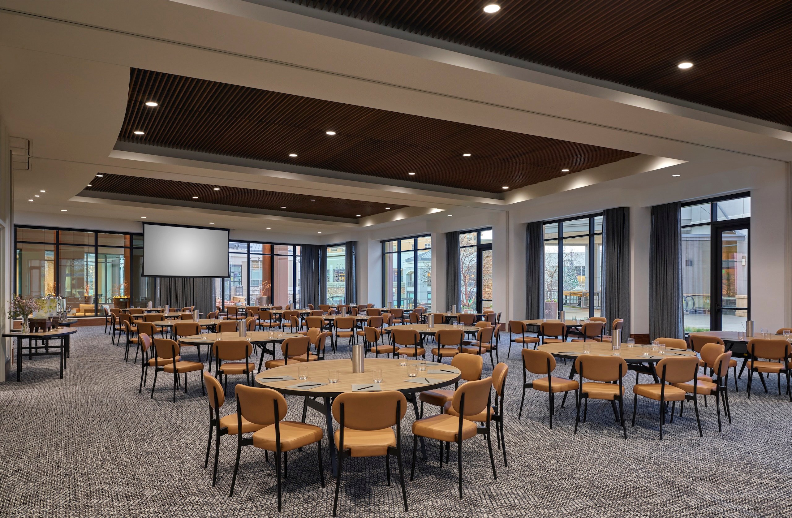 Circular tables set for a business conference in the Wye Ballroom at Asher Adams Hotel, Salt Lake City